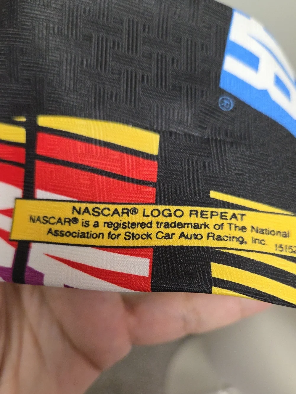 Nascar Ralph Marlin Black Tie with Red, Blue, Yellow and White Logo Blocks